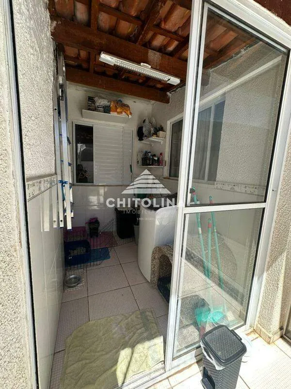 Lavanderia coberta com porta de vidro — Casa em condomínio cód. 11694, Vila Progresso