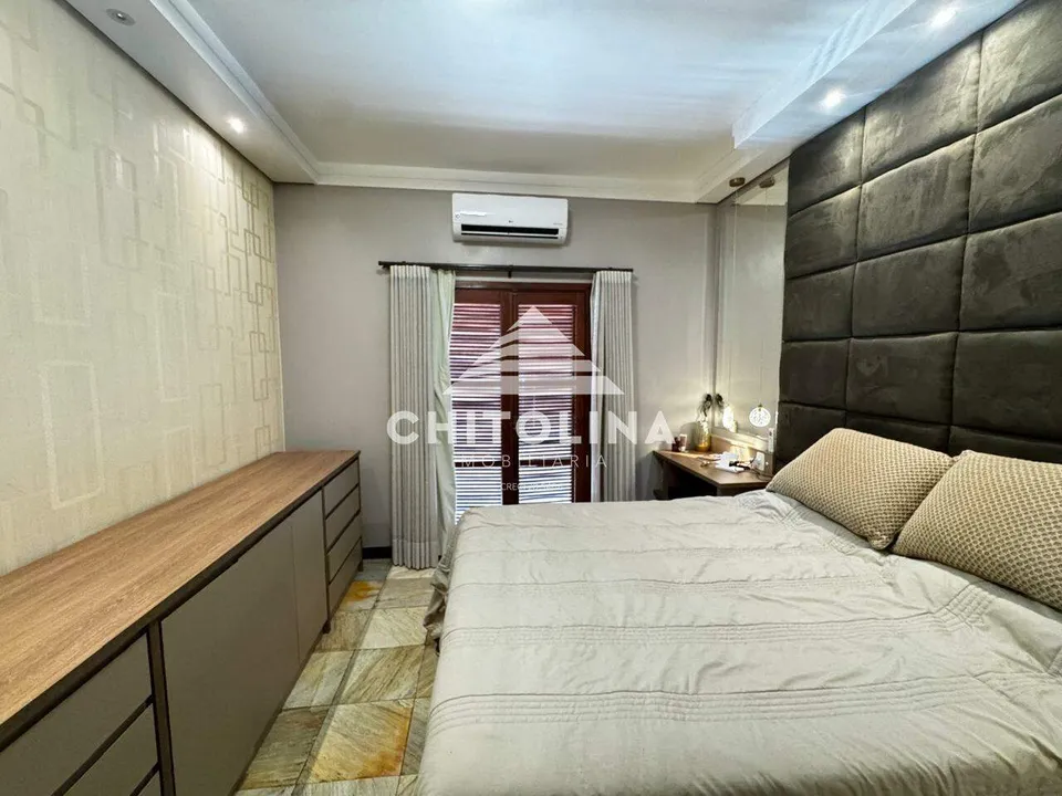 Suíte master com bancada planejada e ar-condicionado — Casa cód. 9584, Jardim Colombo
